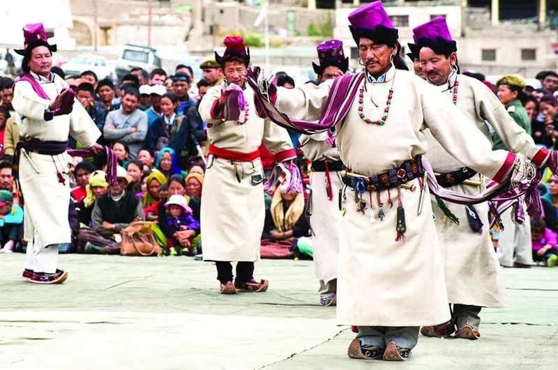 ചിത്രം:Vol5p433 Man in traditional Tibetan clothes performing folk dance.jpg