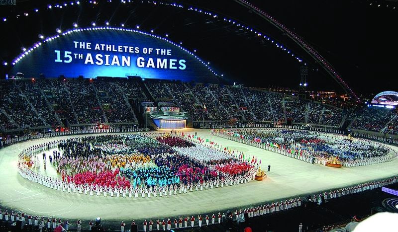 ചിത്രം:Vol5p433 Athletes of the 2006 Asian Games gathered at the center of a main stadium during the opening cere.jpg